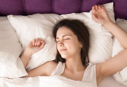 relaxed-woman-lying-with-eyes-closed-bed relaxed-woman-lying-with-eyes-closed-bed
